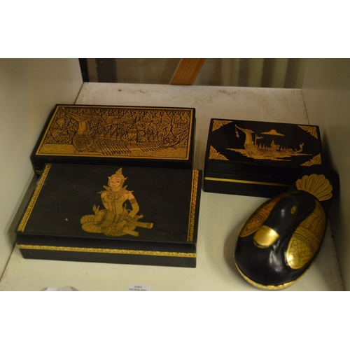 98 - A group of four Thai lacquer boxes.