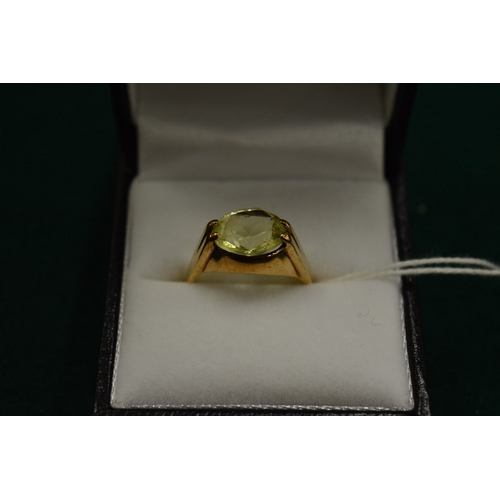 998 - A gold and citrine ring, size N.