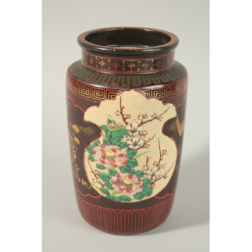 14 - A JAPANESE IMARI PORCELAIN BOTTLE VASE, 25.5cm high, together with an unusual gilded red and black l... 