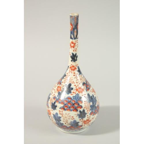 14 - A JAPANESE IMARI PORCELAIN BOTTLE VASE, 25.5cm high, together with an unusual gilded red and black l... 