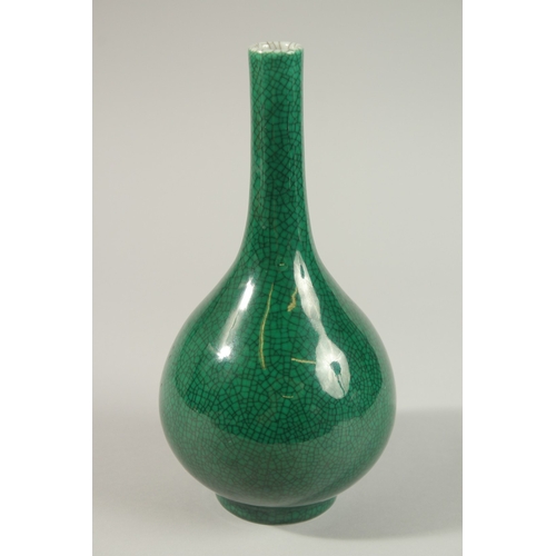 2 - A CHINESE GREEN CRACKLE GLAZE PORCELAIN BOTTLE VASE, 27cm high.