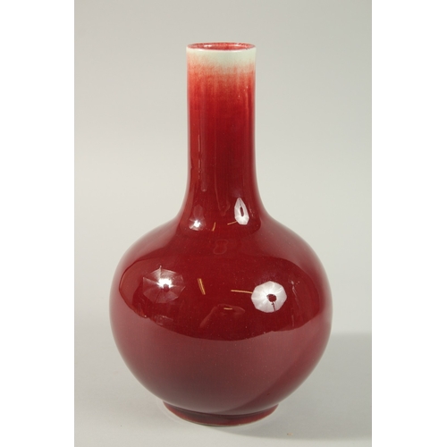 22 - A MID-20TH CENTURY CHINESE SANG DE BOEUF VASE, 29cm high.