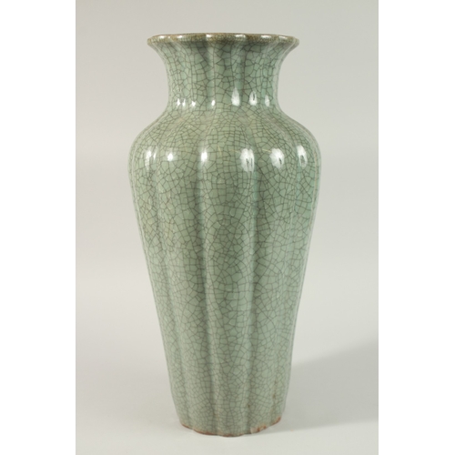 23 - A VERY LARGE CHINESE CELADON CRACKLE GLAZE PORCELAIN VASE, with lobed body and petal-form rim, 48cm ... 