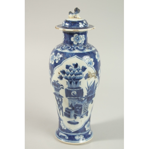 28 - A CHINESE BLUE AND WHITE PORCELAIN JAR AND COVER, 31cm high.