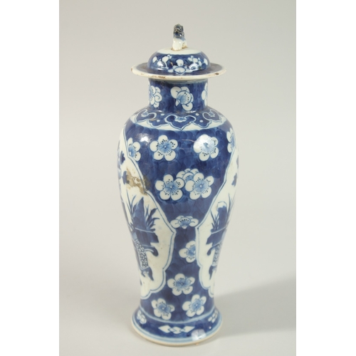 28 - A CHINESE BLUE AND WHITE PORCELAIN JAR AND COVER, 31cm high.