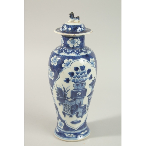 28 - A CHINESE BLUE AND WHITE PORCELAIN JAR AND COVER, 31cm high.