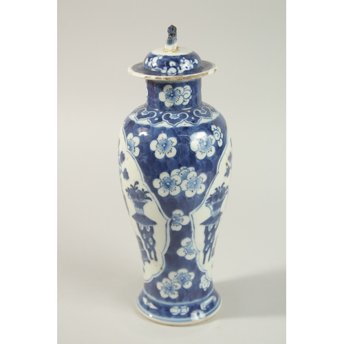 28 - A CHINESE BLUE AND WHITE PORCELAIN JAR AND COVER, 31cm high.