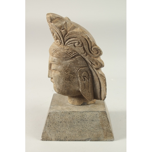 376 - A CHINESE CARVED STONE HEAD WITH CEREMONIAL HEADPIECE, with square-form base, head 28cm high, base 2... 