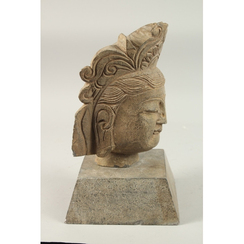 376 - A CHINESE CARVED STONE HEAD WITH CEREMONIAL HEADPIECE, with square-form base, head 28cm high, base 2... 