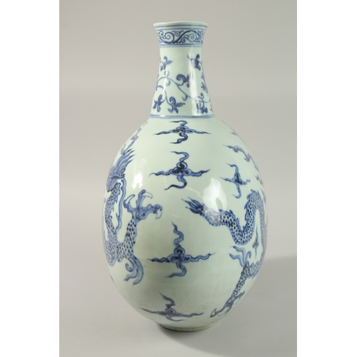 46 - A VERY LARGE CHINESE BLUE AND WHITE PORCELAIN DRAGON MOON FLASK VASE, 45cm high.