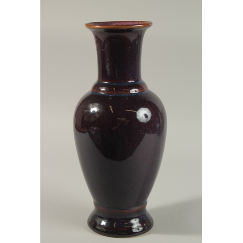 48 - A CHINESE PURPLE FLAMBE-TYPE GLAZED PORCELAIN VASE, 35.5cm high.