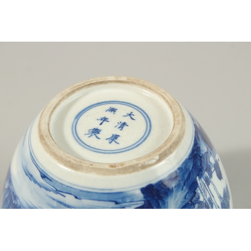 56 - A CHINESE BLUE AND WHITE PORCELAIN JAR, painted with a continuous landscape scene, base with charact... 