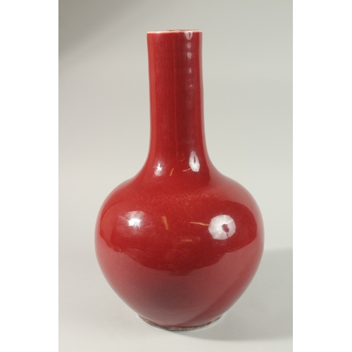 6 - A LARGE CHINESE SANG DE BOEUF GLAZE PORCELAIN VASE, with six-character mark to base, 41cm high.