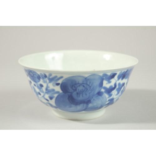 8 - A CHINESE BLUE AND WHITE PORCELAIN BOWL, with flower head decoration to exterior, the base with char... 