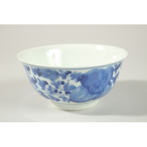 8 - A CHINESE BLUE AND WHITE PORCELAIN BOWL, with flower head decoration to exterior, the base with char... 