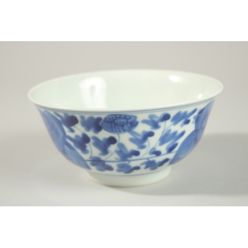 8 - A CHINESE BLUE AND WHITE PORCELAIN BOWL, with flower head decoration to exterior, the base with char... 