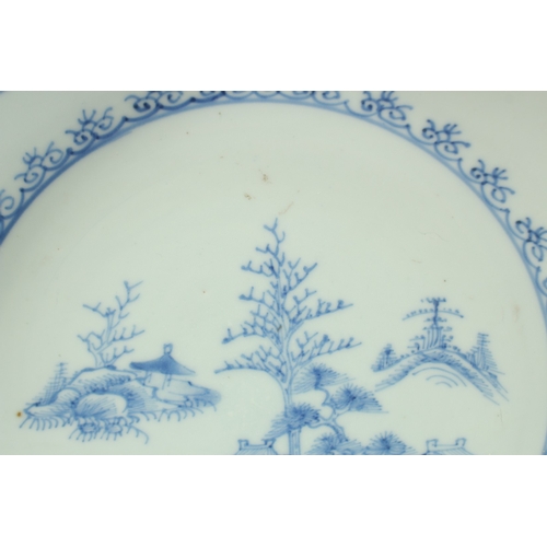 9 - A CHINESE NANKING CARGO BLUE AND WHITE PORCELAIN PLATE, decorated with a central panel of a woodland... 