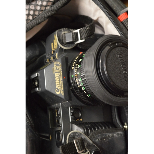 118 - Quantity of assorted cameras and accessories.