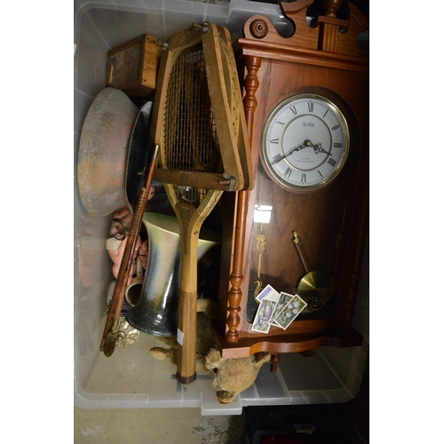126 - A large box of miscellaneous items to include a teddy bear, tennis rackets etc.