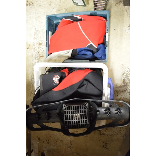 127 - A wet suit with wet suit dryer.