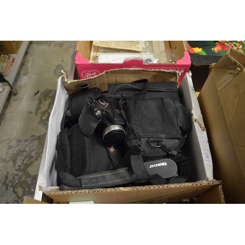 132 - A box of assorted cameras and equipment etc.