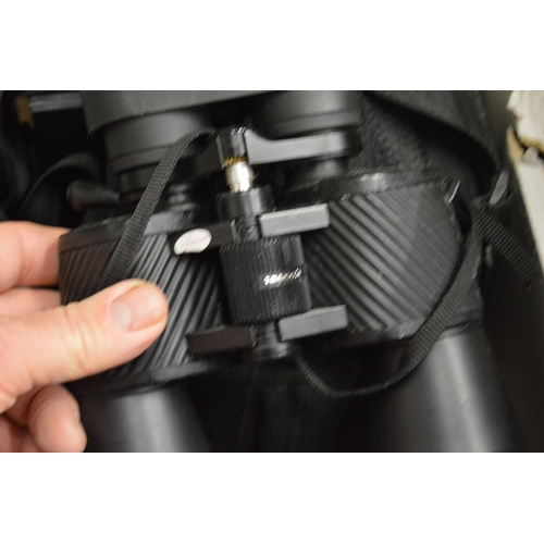 132 - A box of assorted cameras and equipment etc.