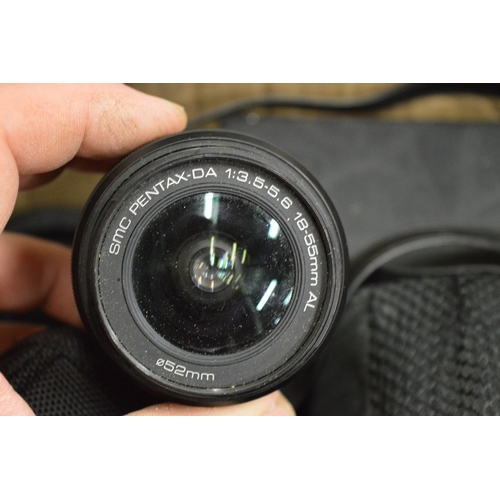 132 - A box of assorted cameras and equipment etc.