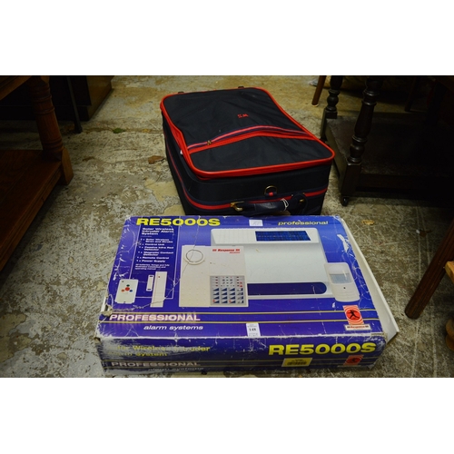 148 - An alarm system and some suitcases.