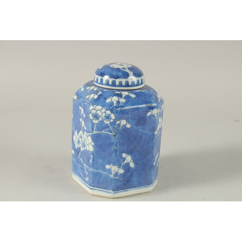 10 - A CHINESE OCTAGONAL BLUE AND WHITE PORCELAIN PRUNUS JAR AND COVER, the base with four-character mark... 