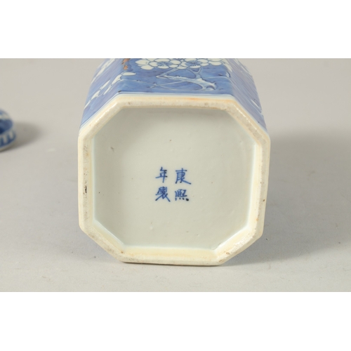 10 - A CHINESE OCTAGONAL BLUE AND WHITE PORCELAIN PRUNUS JAR AND COVER, the base with four-character mark... 