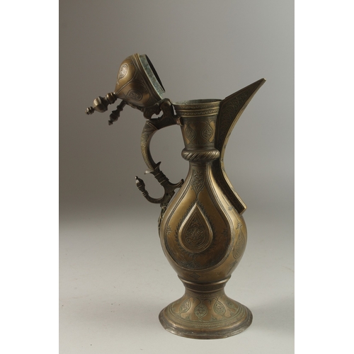 102 - A FINE 19TH CENTURY CENTRAL ASIAN BUKHARA ENGRAVED BRASS EWER, 36cm high.