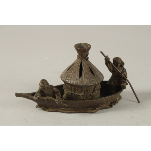 28 - A BRONZE OKIMONO OF FISHERMEN ON A BOAT, 14cm long.