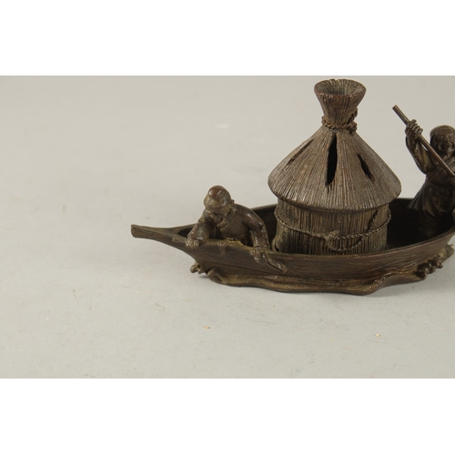 28 - A BRONZE OKIMONO OF FISHERMEN ON A BOAT, 14cm long.