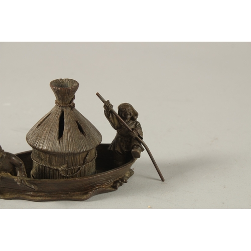 28 - A BRONZE OKIMONO OF FISHERMEN ON A BOAT, 14cm long.