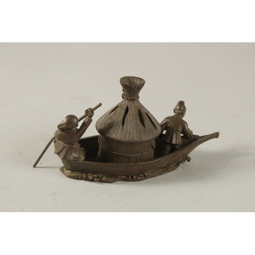 28 - A BRONZE OKIMONO OF FISHERMEN ON A BOAT, 14cm long.