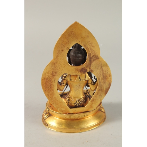 31 - A TIBETAN GILT ALLOY BUDDHA, 17cm high.