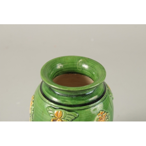 36 - A CHINESE TANG STYLE POTTERY TRIPOD CENSER ON HARDWOOD STAND, censer 13.5cm high.