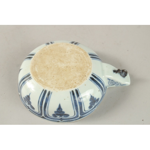 41 - A CHINESE BLUE AND WHITE PORCELAIN OIL POURER, painted with ducks and lotus, bowl 13cm diameter.