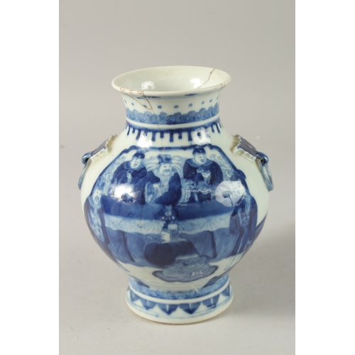 45 - A CHINESE BLUE AND WHITE PORCELAIN VASE, with moulded ring handles and painted with figures, base wi... 