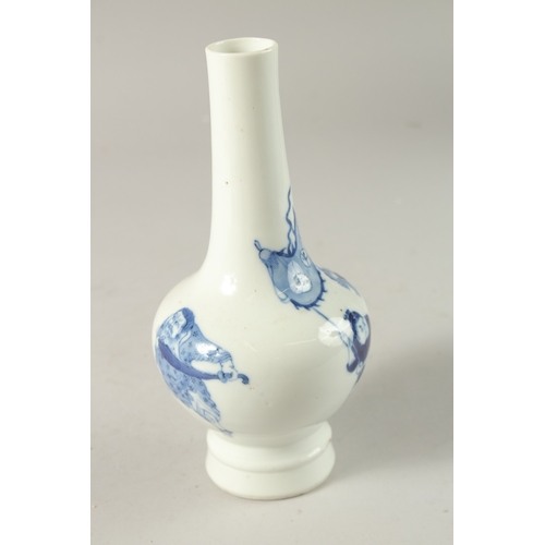 46 - A CHINESE BLUE AND WHITE PORCELAIN BOTTLE VASE, painted with figure on horseback, the base with six-... 