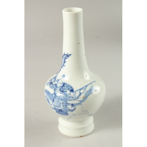 46 - A CHINESE BLUE AND WHITE PORCELAIN BOTTLE VASE, painted with figure on horseback, the base with six-... 