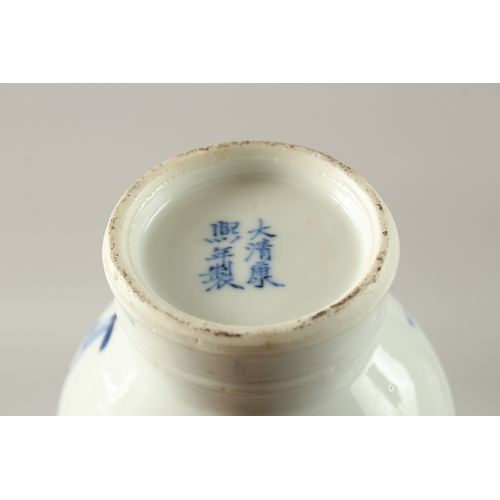 46 - A CHINESE BLUE AND WHITE PORCELAIN BOTTLE VASE, painted with figure on horseback, the base with six-... 