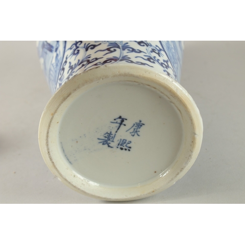 47 - A CHINESE BLUE AND WHITE PORCELAIN LIDDED VASE, finely painted with two mirrored panels of of birds ... 