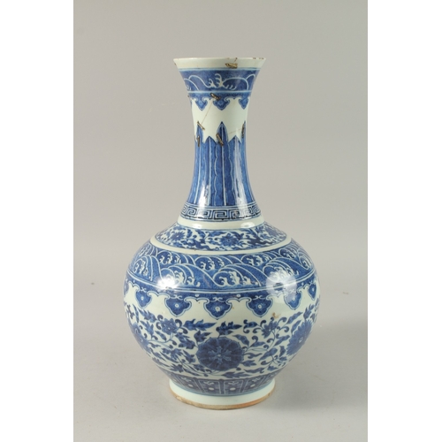 48 - A LARGE CHINESE BLUE AND WHITE PORCELAIN VASE, painted with stylised motifs of flowers heads, waves,... 