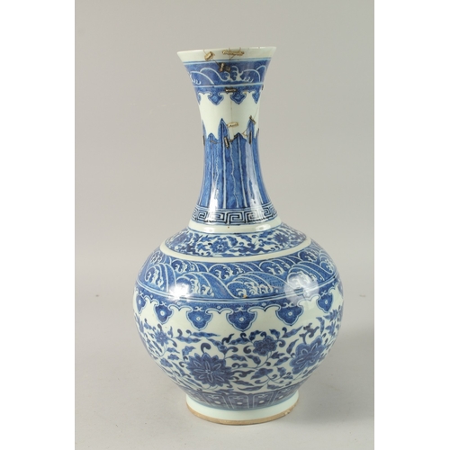 48 - A LARGE CHINESE BLUE AND WHITE PORCELAIN VASE, painted with stylised motifs of flowers heads, waves,... 