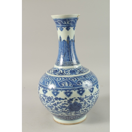 48 - A LARGE CHINESE BLUE AND WHITE PORCELAIN VASE, painted with stylised motifs of flowers heads, waves,... 