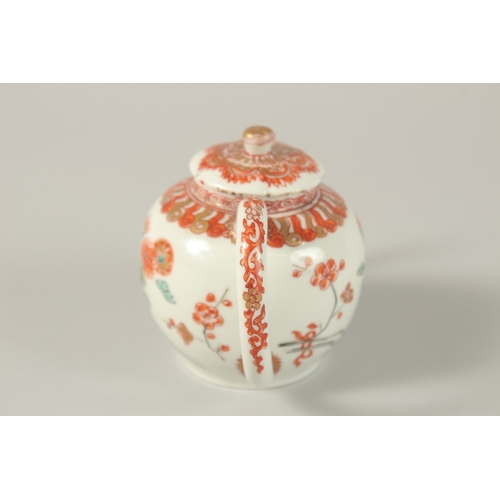 54 - A 17TH CENTURY CHINESE COPPER RED AND WHITE PORCELAIN MINIATURE TEAPOT, painted with flora and gilde... 