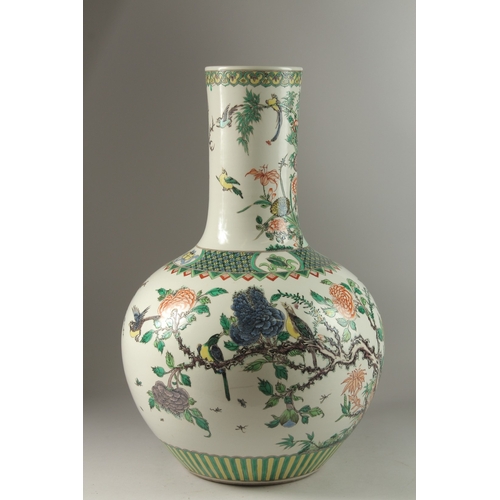 6 - A VERY LARGE CHINESE FAMILLE VERTE PORCELAIN BULBOUS VASE, painted with various exotic birds and nat... 