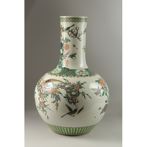 6 - A VERY LARGE CHINESE FAMILLE VERTE PORCELAIN BULBOUS VASE, painted with various exotic birds and nat... 