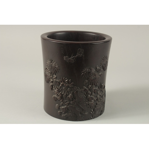 66 - A FINE AND LARGE 18TH-19TH CENTURY HARDWOOD BITONG BRUSH POT, with finely carved relief floral decor... 